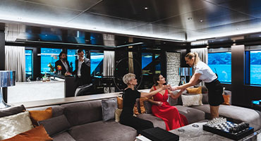 Group of people inside yacht