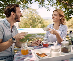 Man and woman having a picnic in a park