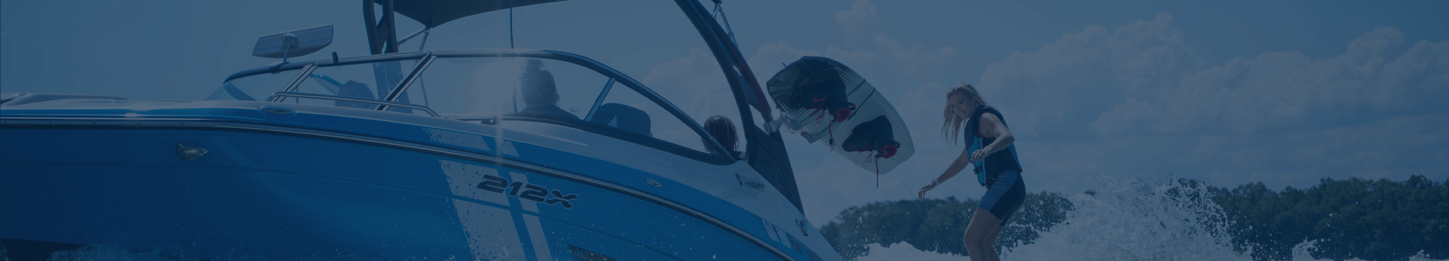 Boat sailing with wakeboarder