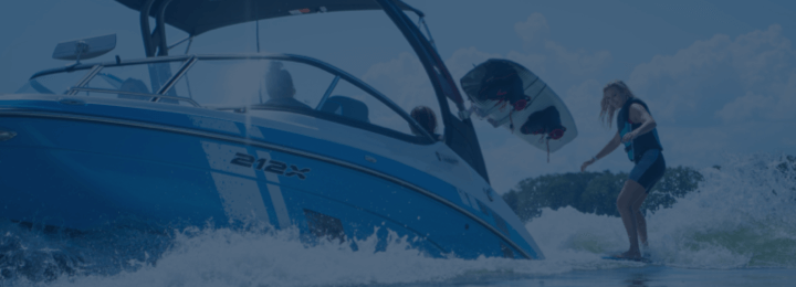 Boat sailing with wakeboarder