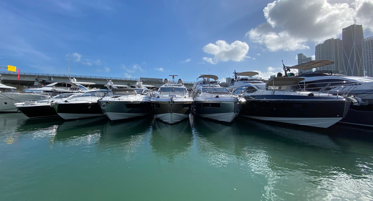 Yachts in a line on the water