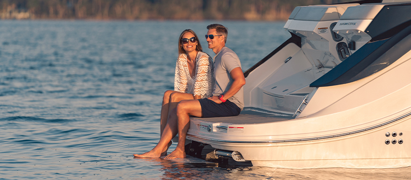 Couple on the back of a boat